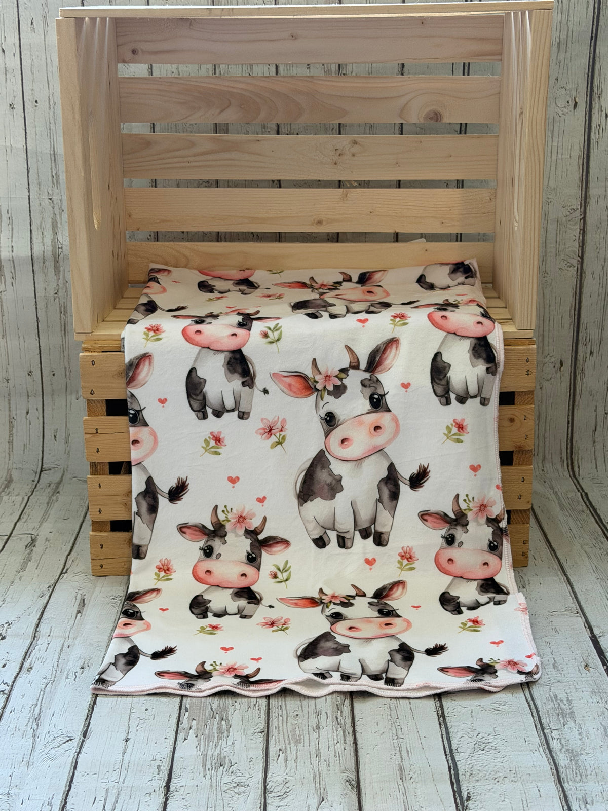 Couverture en squish Vache champs de fleurs rose