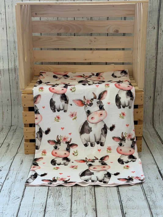 Couverture en squish Vache champs de fleurs rose